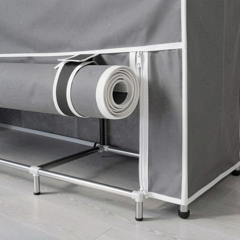 Gray fabric closet organizer with zipper and rolled-up cover