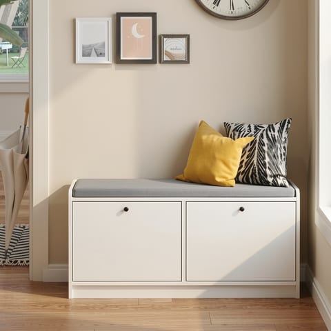 Shoe storage bench with cushions in a hallway