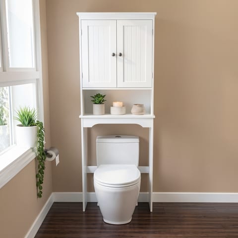 White bathroom storage cabinet above toilet with closed doors