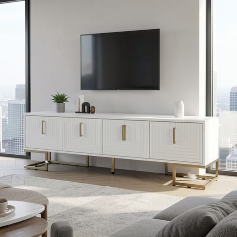 Modern white TV stand with gold handles and metal legs in a stylish living room