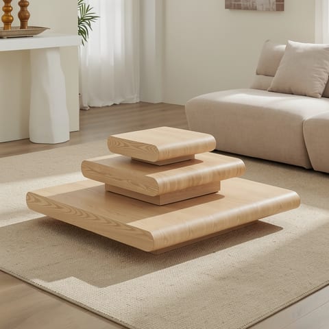 A 3-piece modular stacking coffee table set made of MDF with a natural wood look, comprising a large square table, a smaller square table, and a rectangular tab