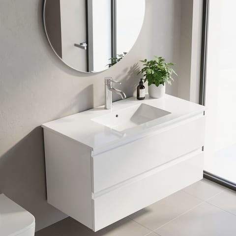Glossy white bathroom vanity with two drawers and sink