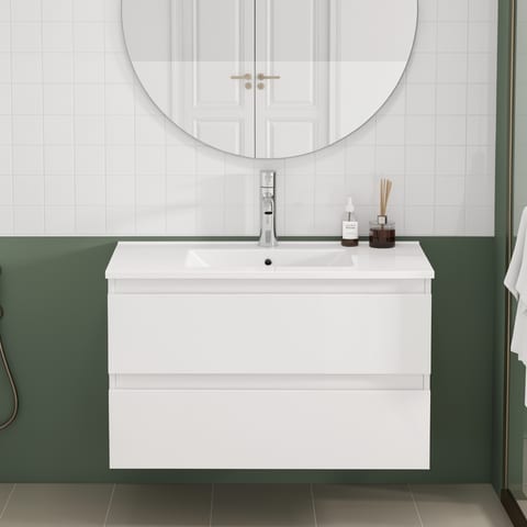 Glossy white bathroom vanity with sink and two drawers
