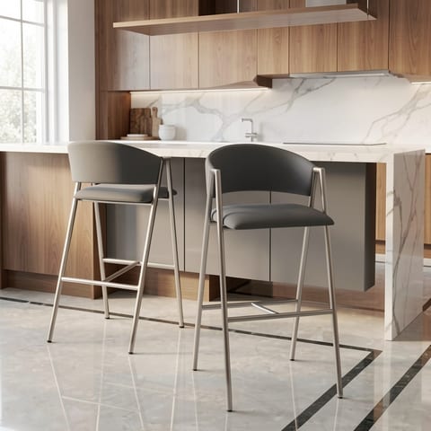 Two gray bar chairs with silver legs at a white marble kitchen island.