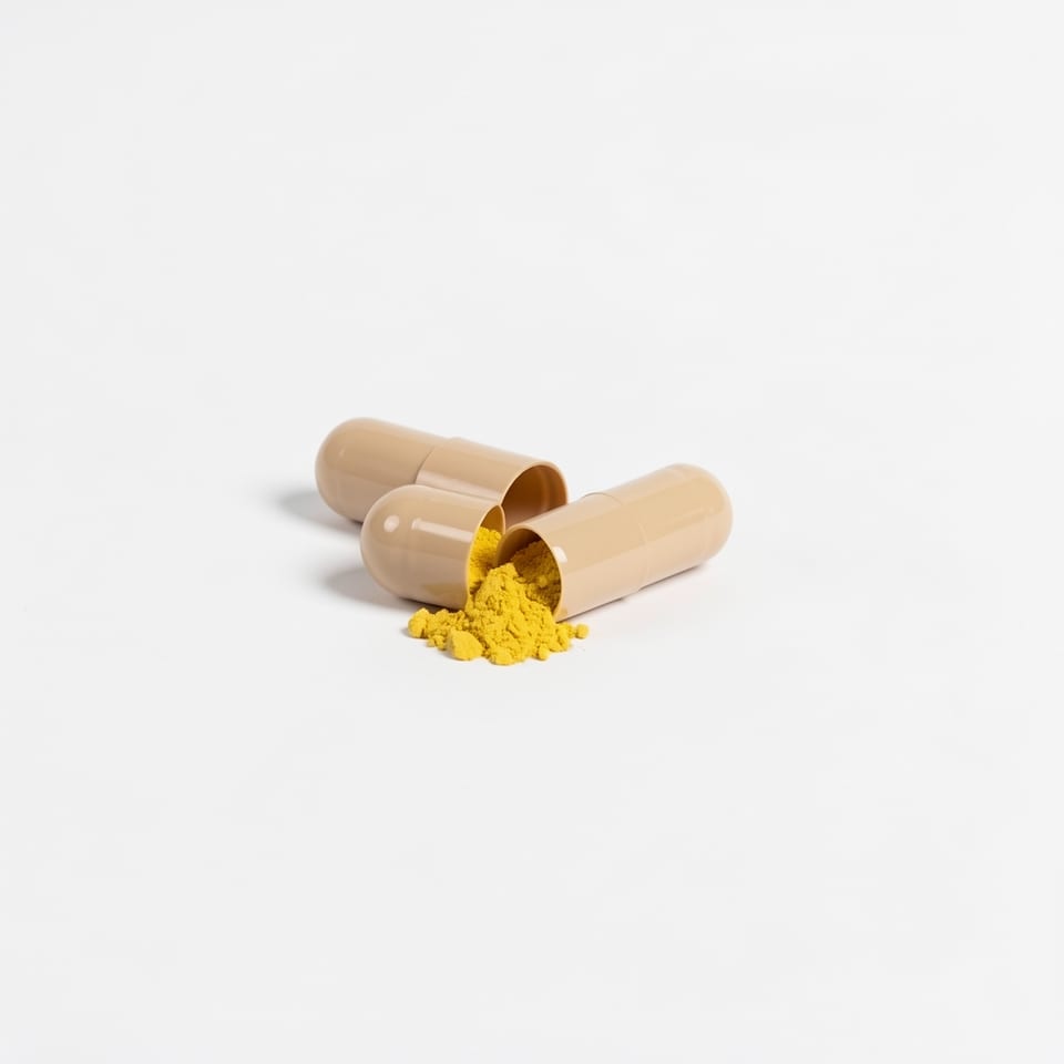 Moringa Pure supplement bottle with capsules spilled out