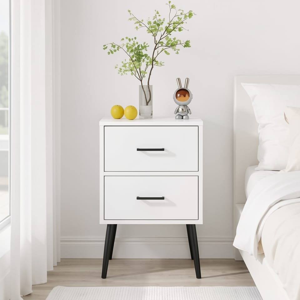 Modern white 2-drawer nightstand with metal legs and handles in a bedroom