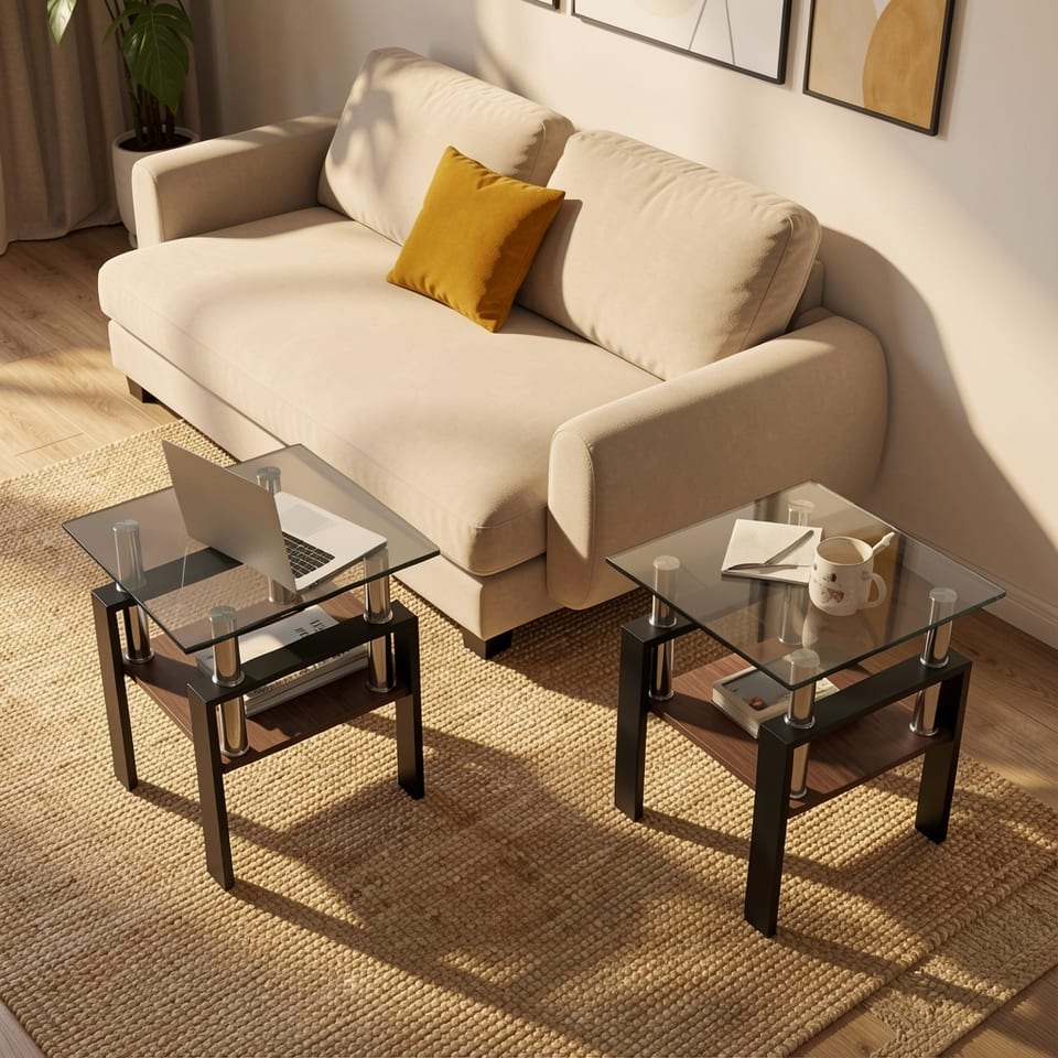 A set of two modern tempered glass end tables with black metal frames and wooden shelves, placed in a living room with a beige couch.